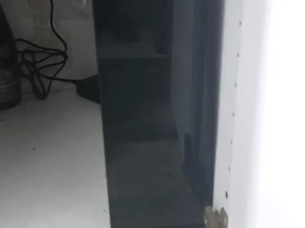Ósmosis de flujo directo instalada en el mueble bajo fregadero de una cocina en Cataluña